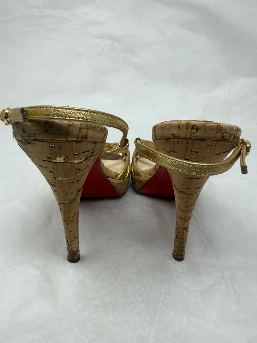 Christian Louboutin shiny gold
