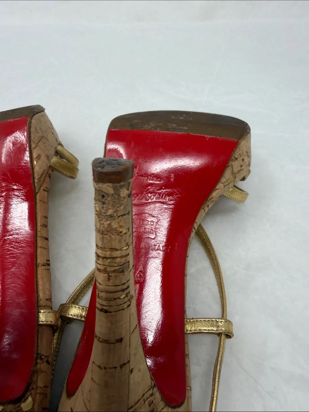 Christian Louboutin shiny gold