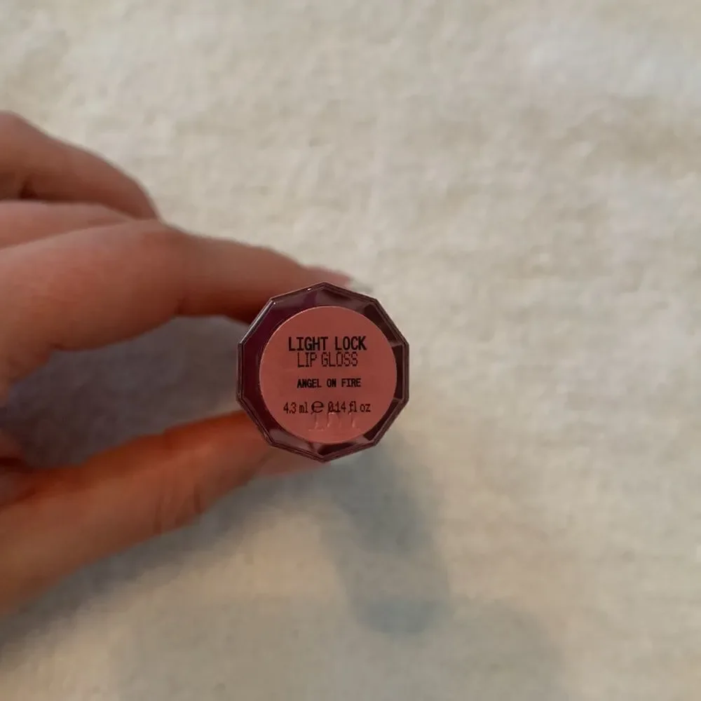 About Face Light Lock Lip Gloss