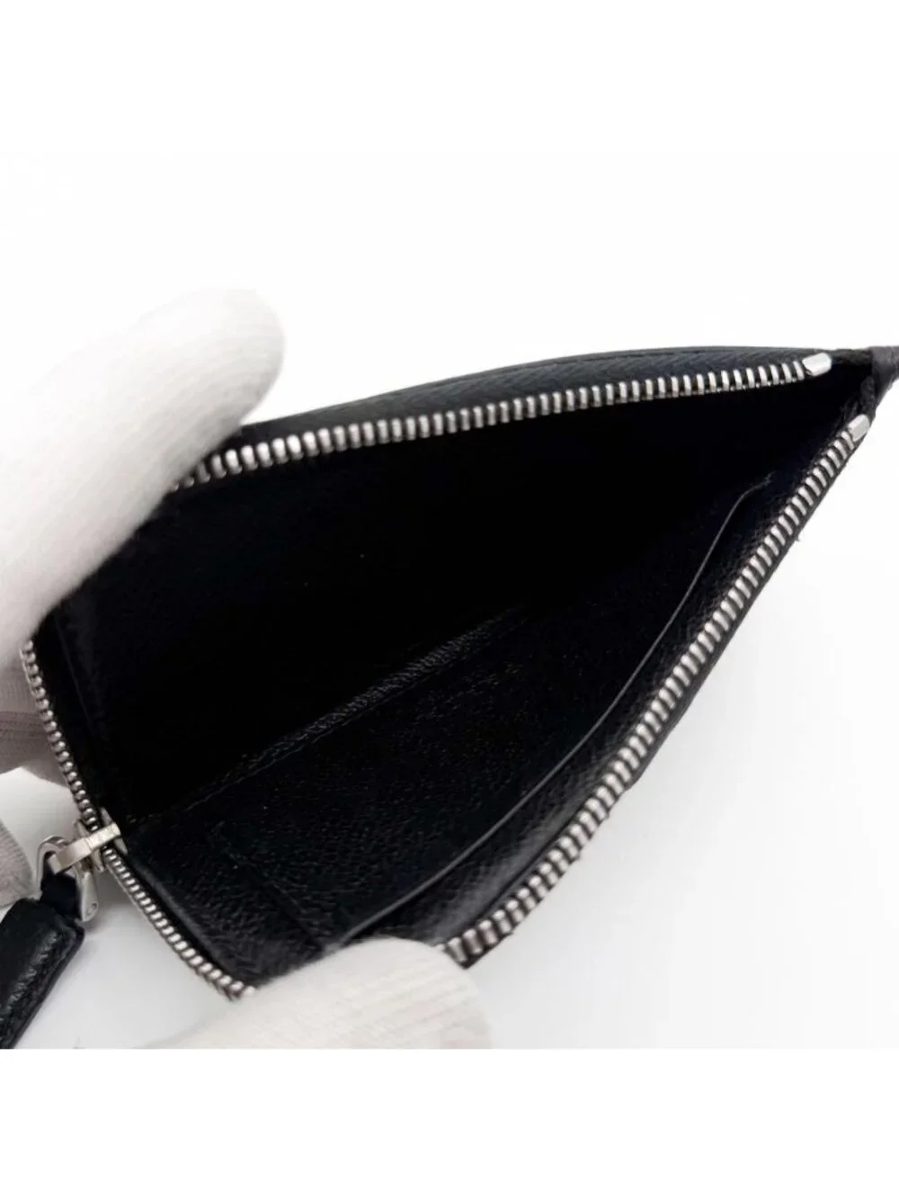 Prada brand triangle