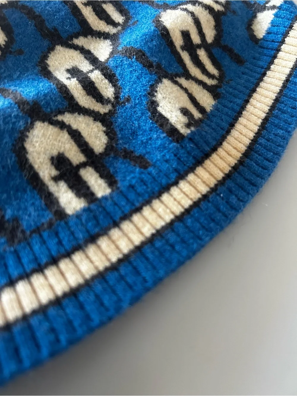 On the Roll knit fashion tags