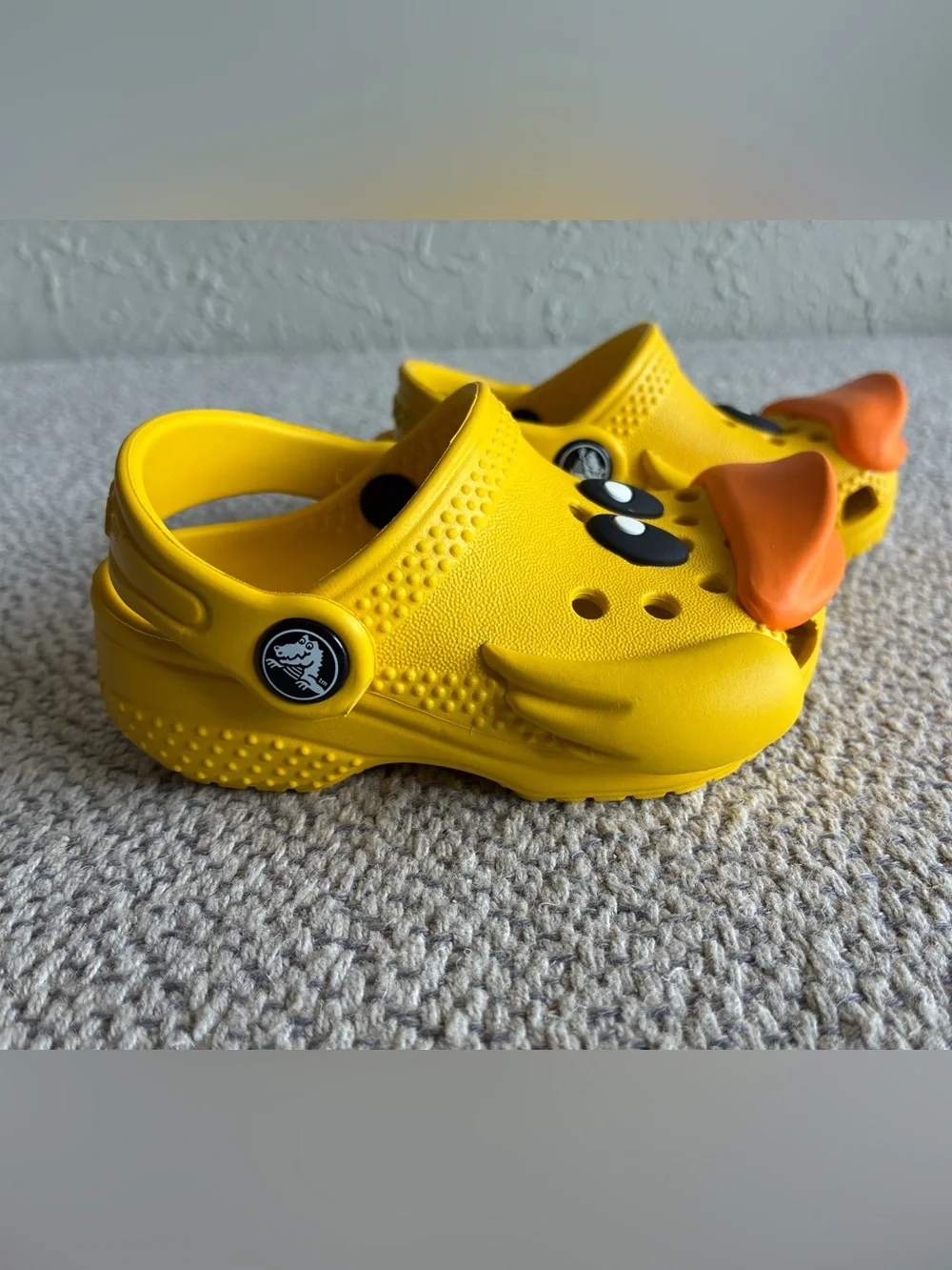 CROCS wings signs owned