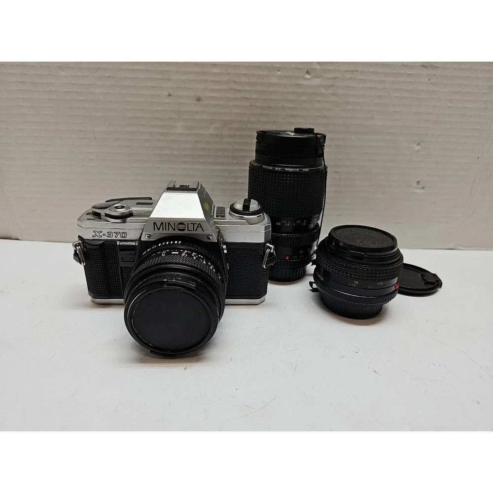 Minolta X-370 35mm SLR Film Camera with Extra Lenses **UNTESTED**‎