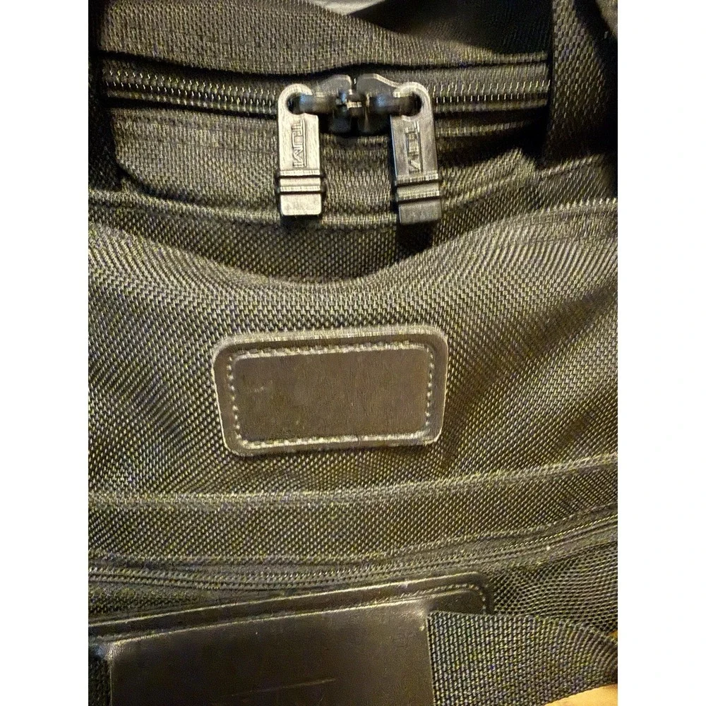 Tumi approximately 14