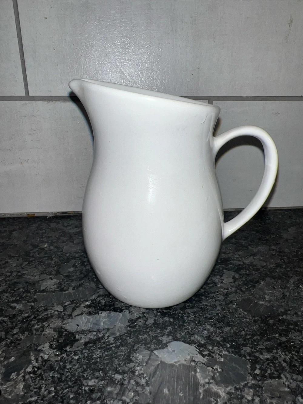 Corning Centura White Ceramic Milk/Creamer. Exc condition Goes with all patterns
