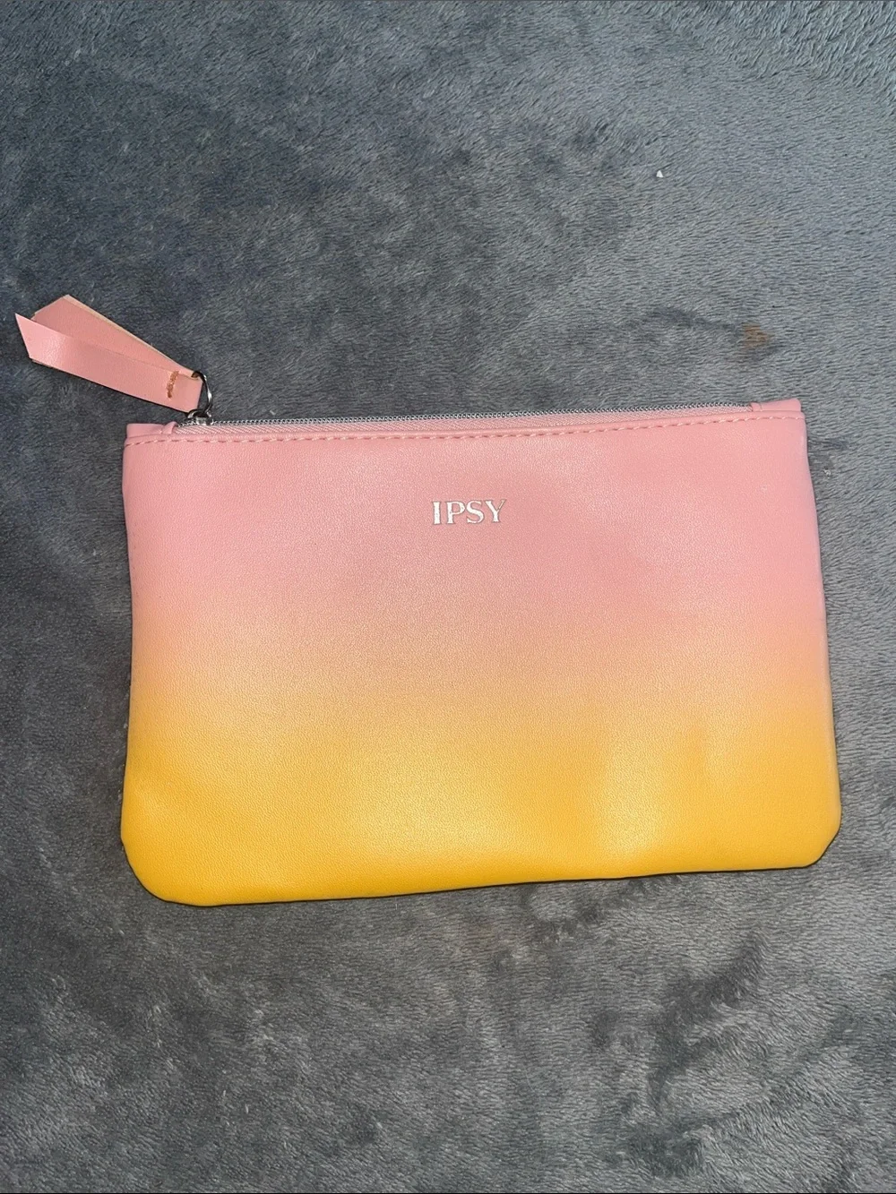 Clinique, Estee Lauder, Nine West cosmetic bags