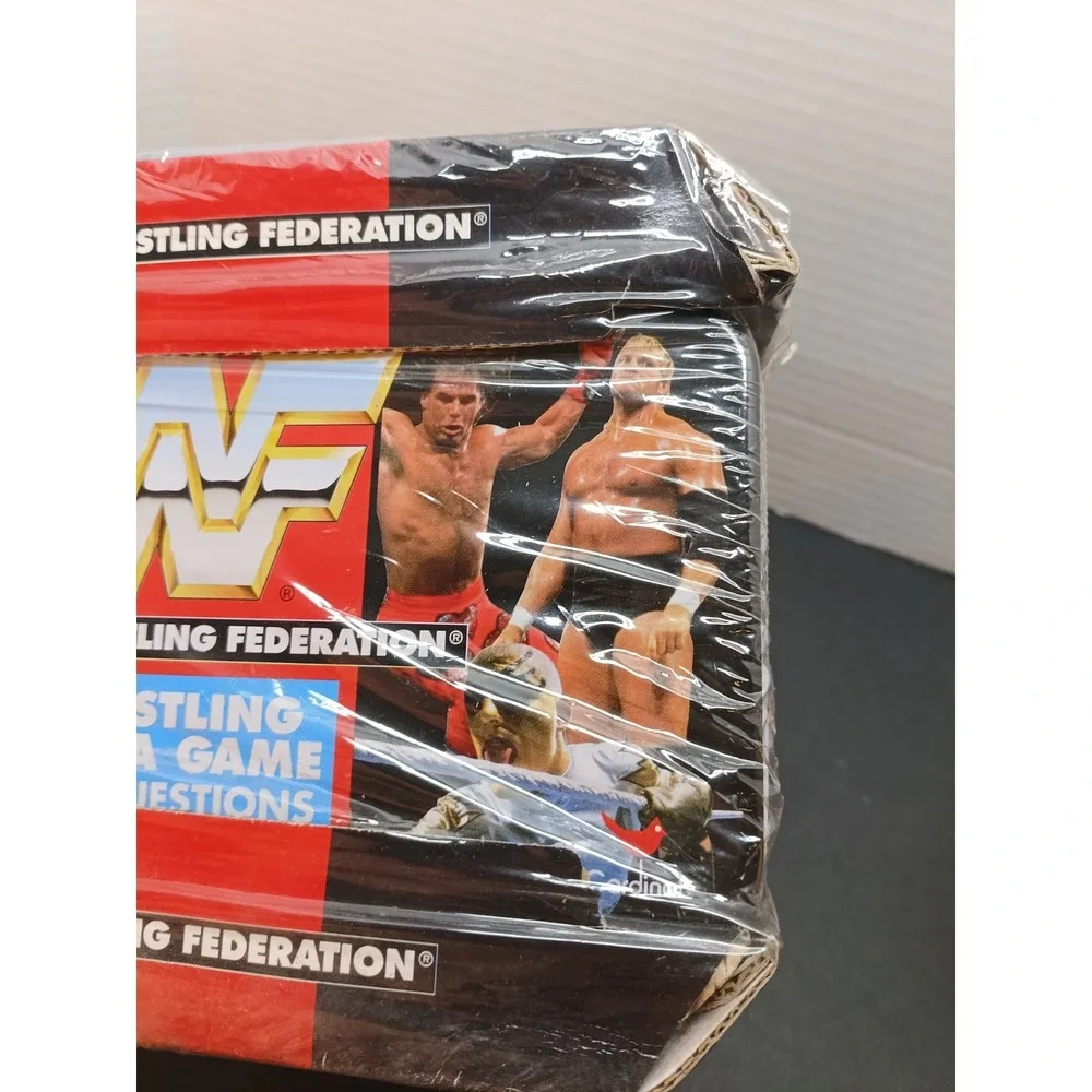 WWF Wrestling Trivia Game Tin SEALED NEW WWE ROCKY MAIVIA Rookie ROCK AUSTIN RC