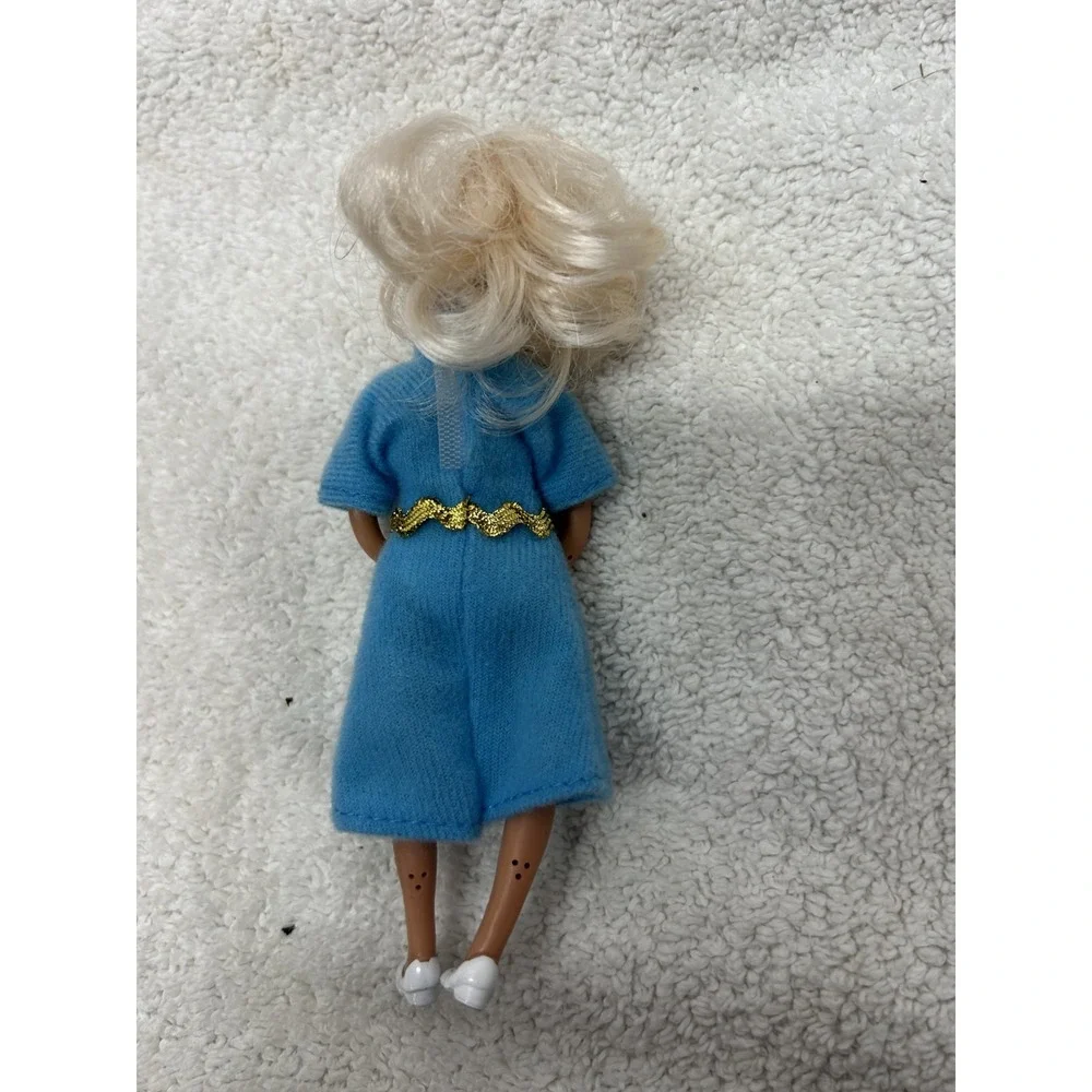 N/A dollhouse woman