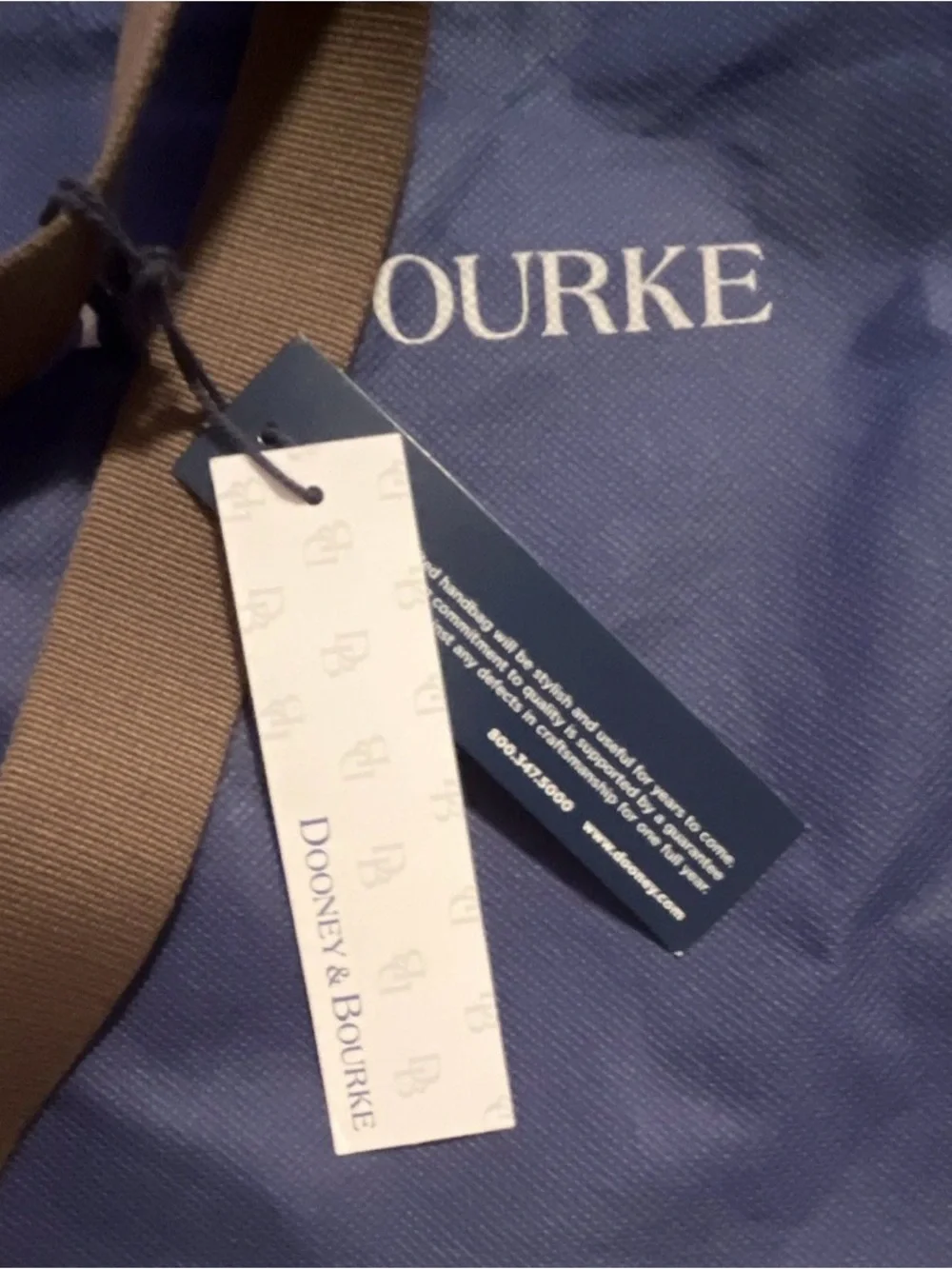 Dooney & Bourke compact leather
