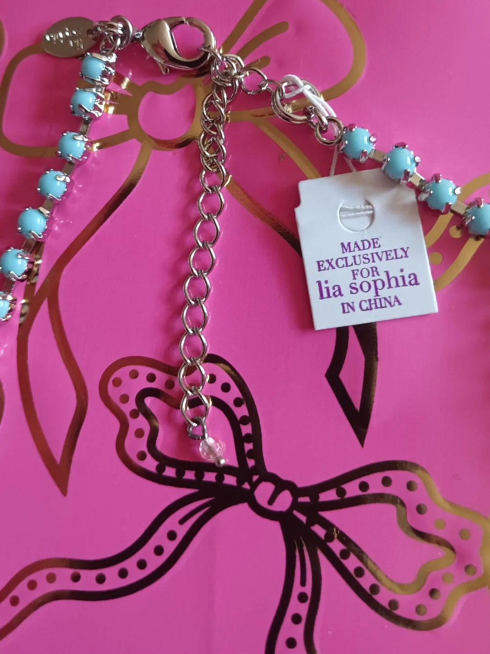 Lia Sophia bright turquoise