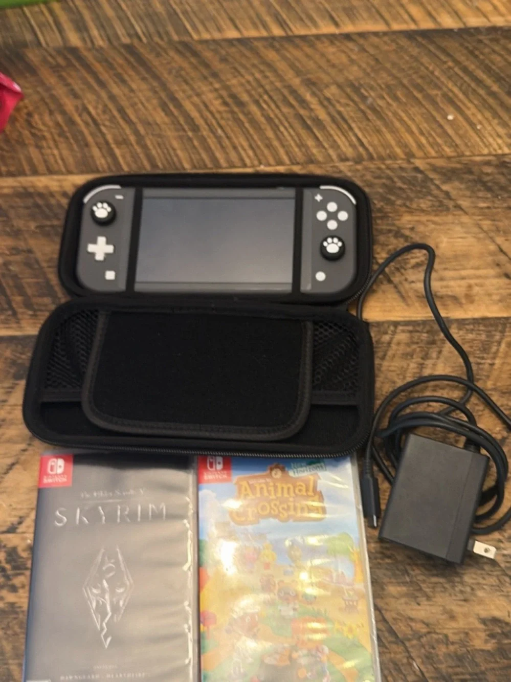 Nintendo Switch Lite Gray Handheld System Case and Skyrim And Animal Crossing
