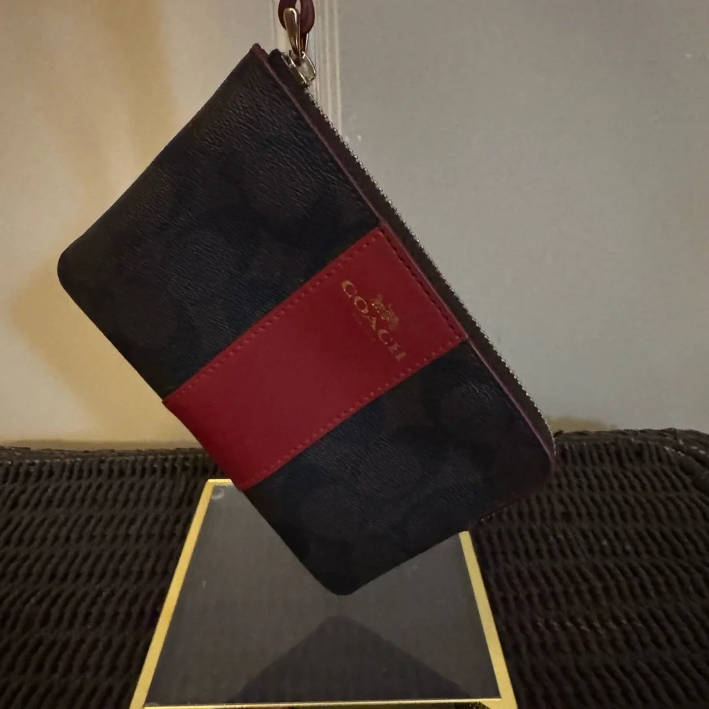 Coach Brown and‎ Red Wristlet
